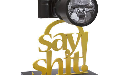 Ernesto Javier Fernández Say shit, 2016 28 x 30 x 43 cm. Cámara Canon EOS 1, Impresión digital Proyecto de acrílico y luces LED