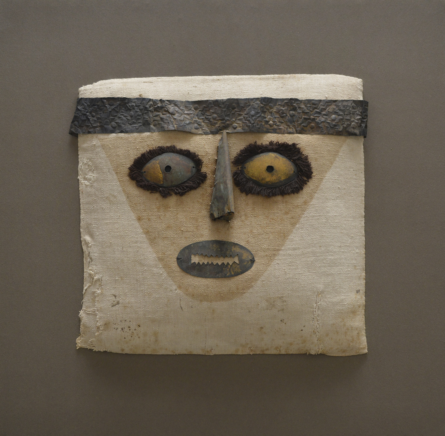 Cabeza textil de fardo funerario.