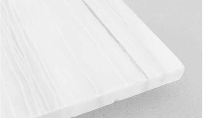 Paula Cortázar (Mexico, b.1991) De la Serie Humanos, 2019. Mármol grabado. 40 x 40 x 2 cm.