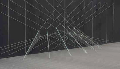 Lydia Okumura. In Front Of Light, 1977. String, glass, nail oil - 23 x 86 1/6 x 43 inches.